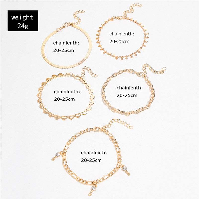 Anklets for Women: A Trendy Set Of 5 Gold Anklets + Heart Crystal Key (Anklets Lengths)